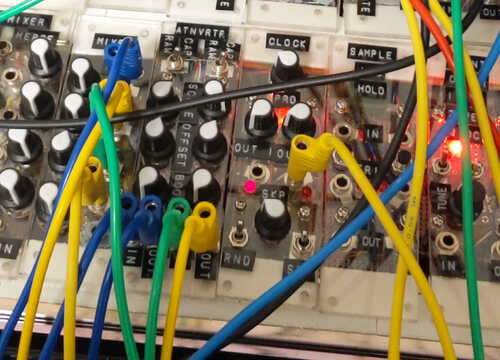 Picture-hanging strips replace the bolts attaching the modules to the frame