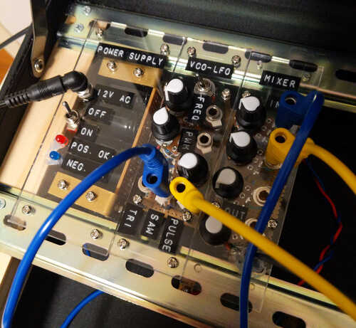 Three modules attached to the frame with some banana cables attached
